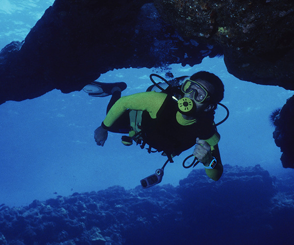 Man exploring underwater cave