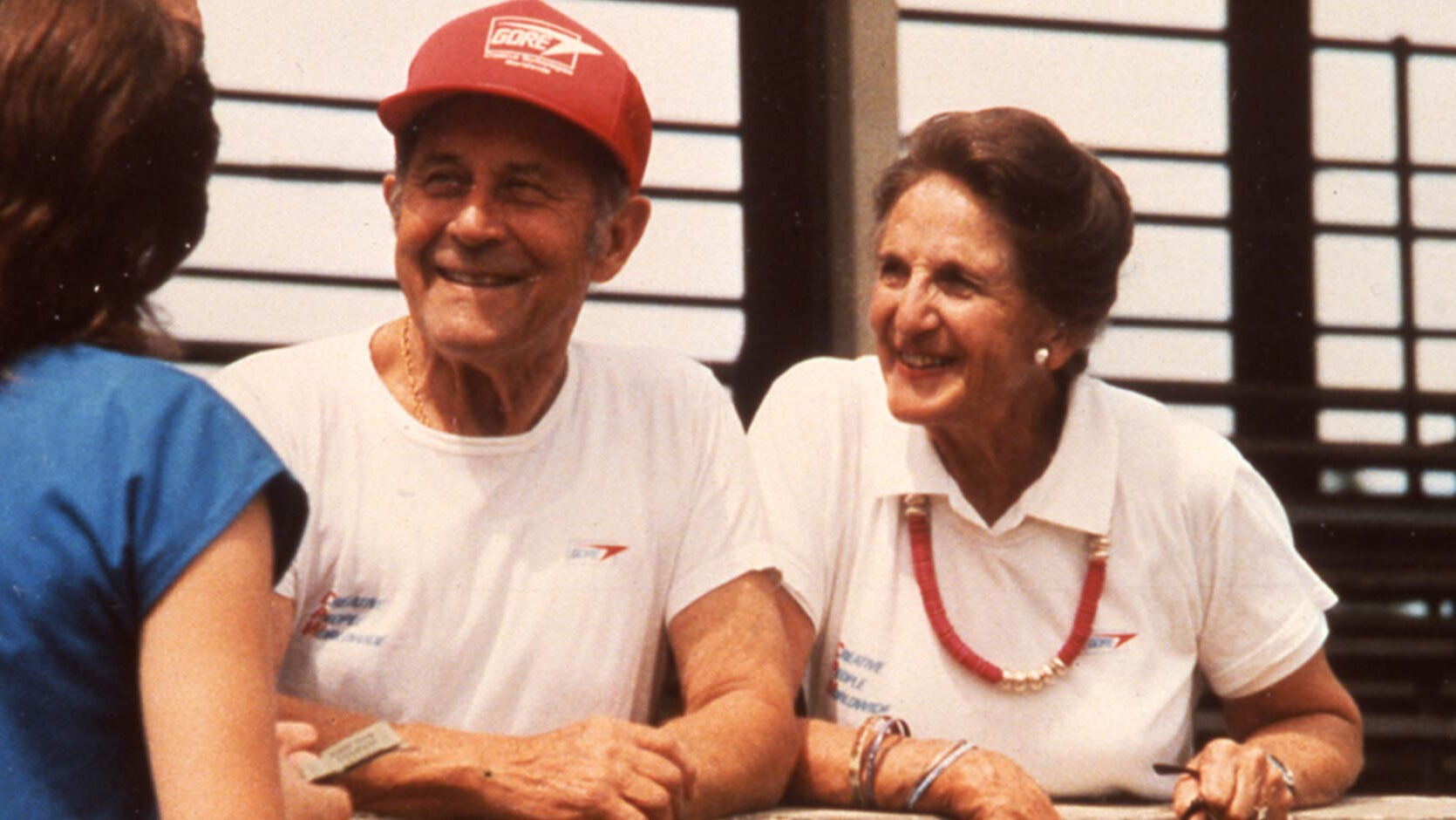 Legacy image of Bill and Vieve Gore speaking with someone in the foreground