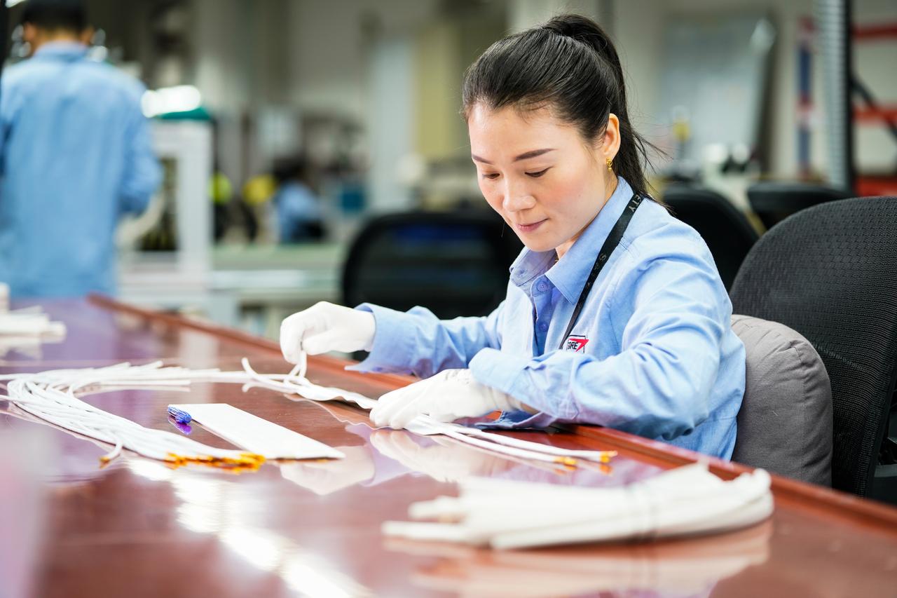 associate inspecting product in a plant