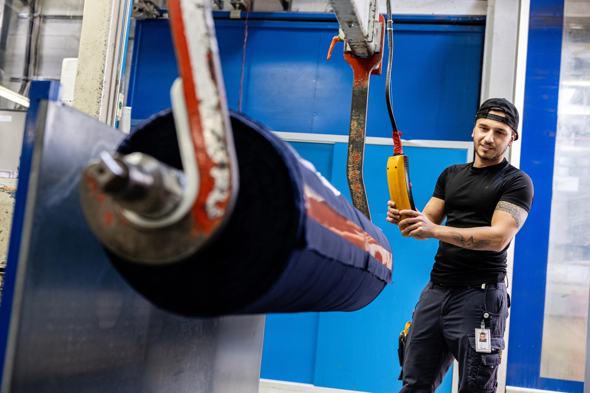 associate working in a materials manufacturing process