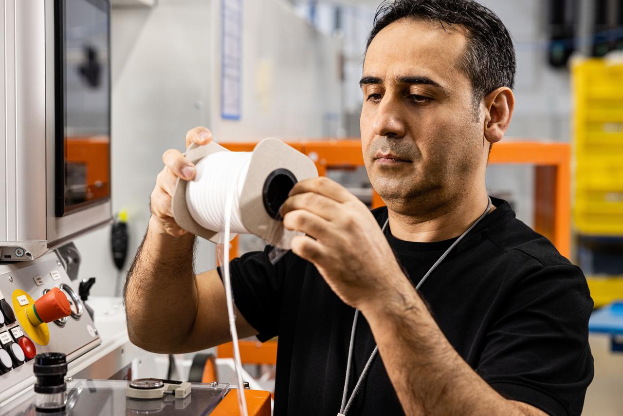 associate inspecting product in a plant