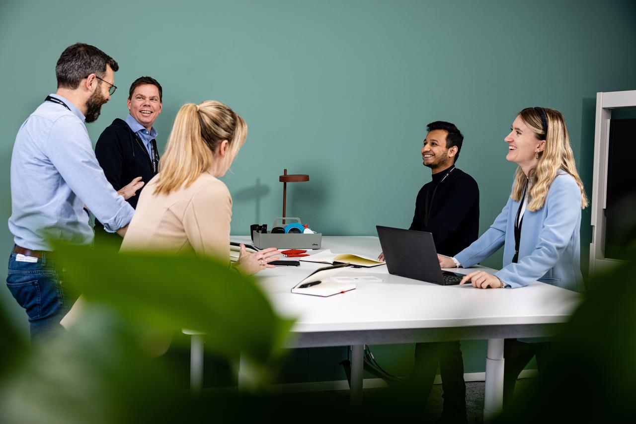 associates working together in a collaboration space