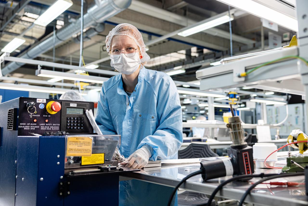 associate inspecting product in a plant