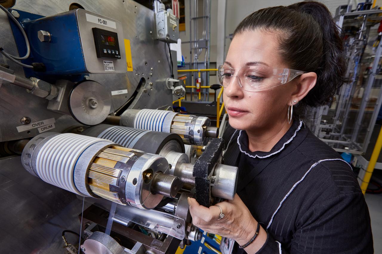 Gore associate working at a machine in the plant