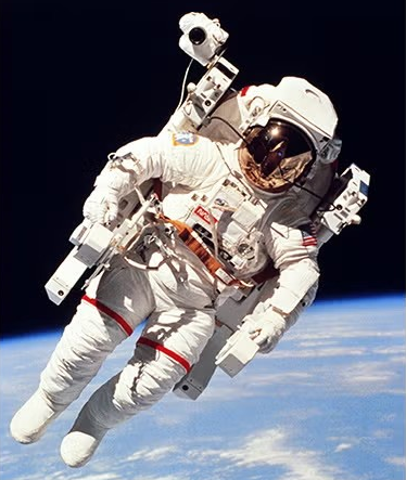 image of astronaut floating in space with earth in background