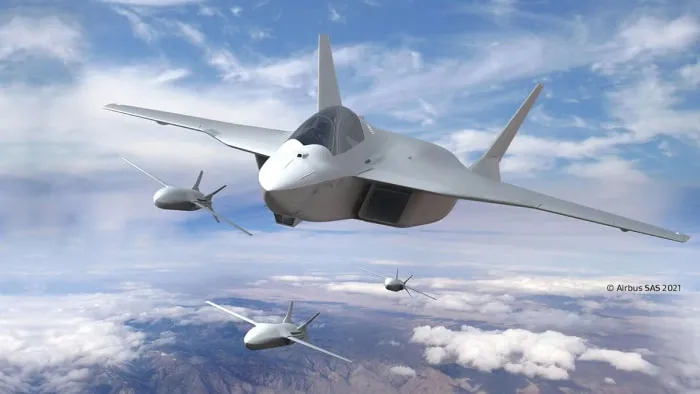 Aircraft flying over a clear sky.