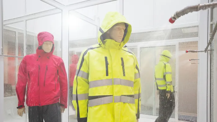 rain room with gore-tex jackets being tested